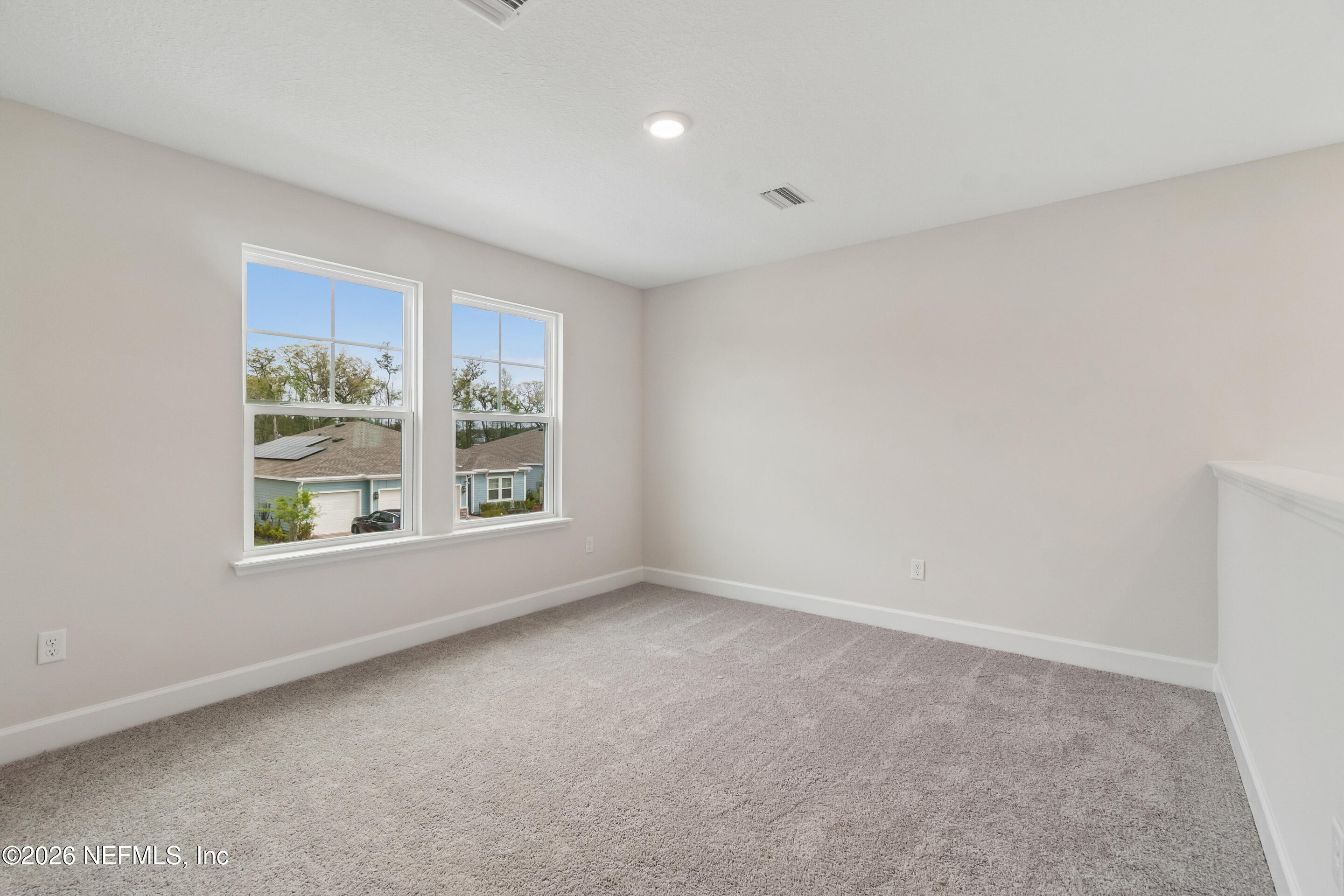 75751 Bayley Place Yulee, FL 32097 - Photo 27 of 28 a view of an empty room with a window