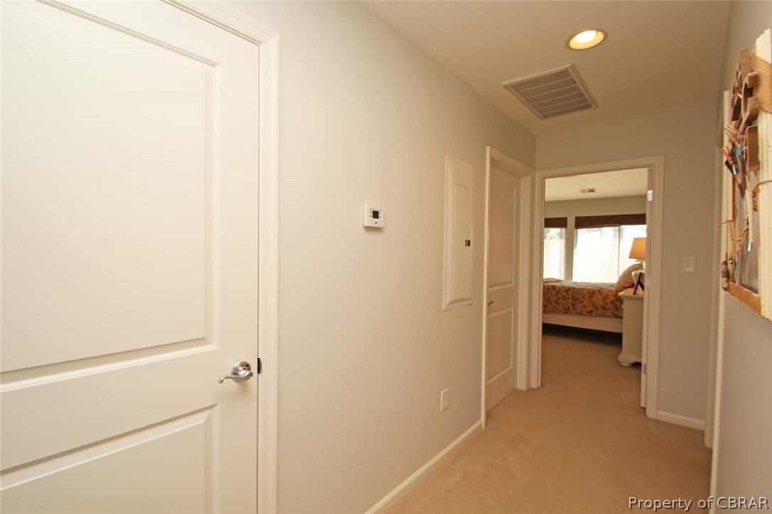 6819 Windmill Point Road White Stone, VA 22578 - Photo 25 of 50 Hallway has a closet, access to the En-Suite Bedroom's bathroom & two Bedrooms with water views