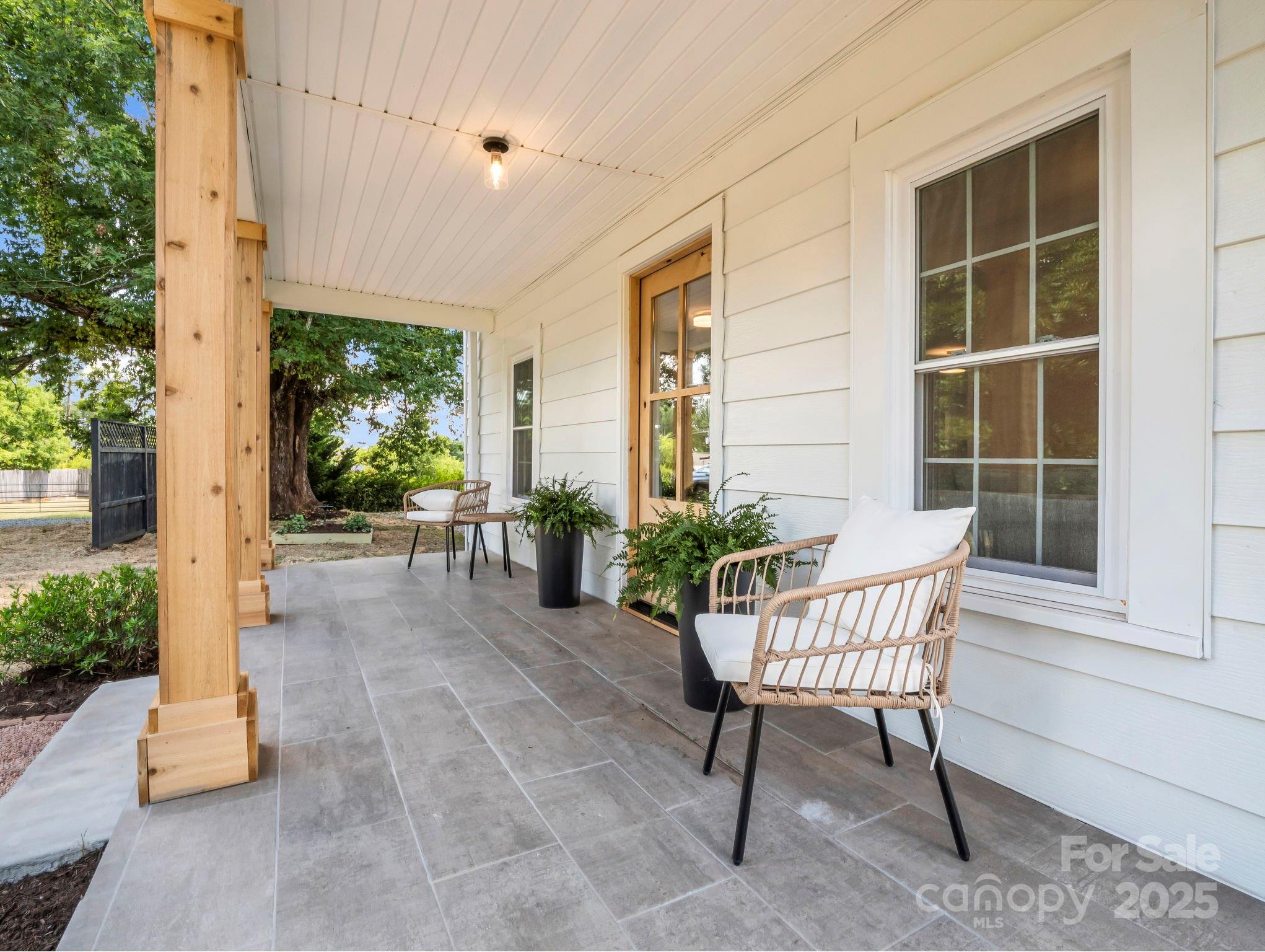 5990 South Nc 9 Highway Tryon, NC 28782 - Photo 2 of 42 a view of a house with backyard and sitting area