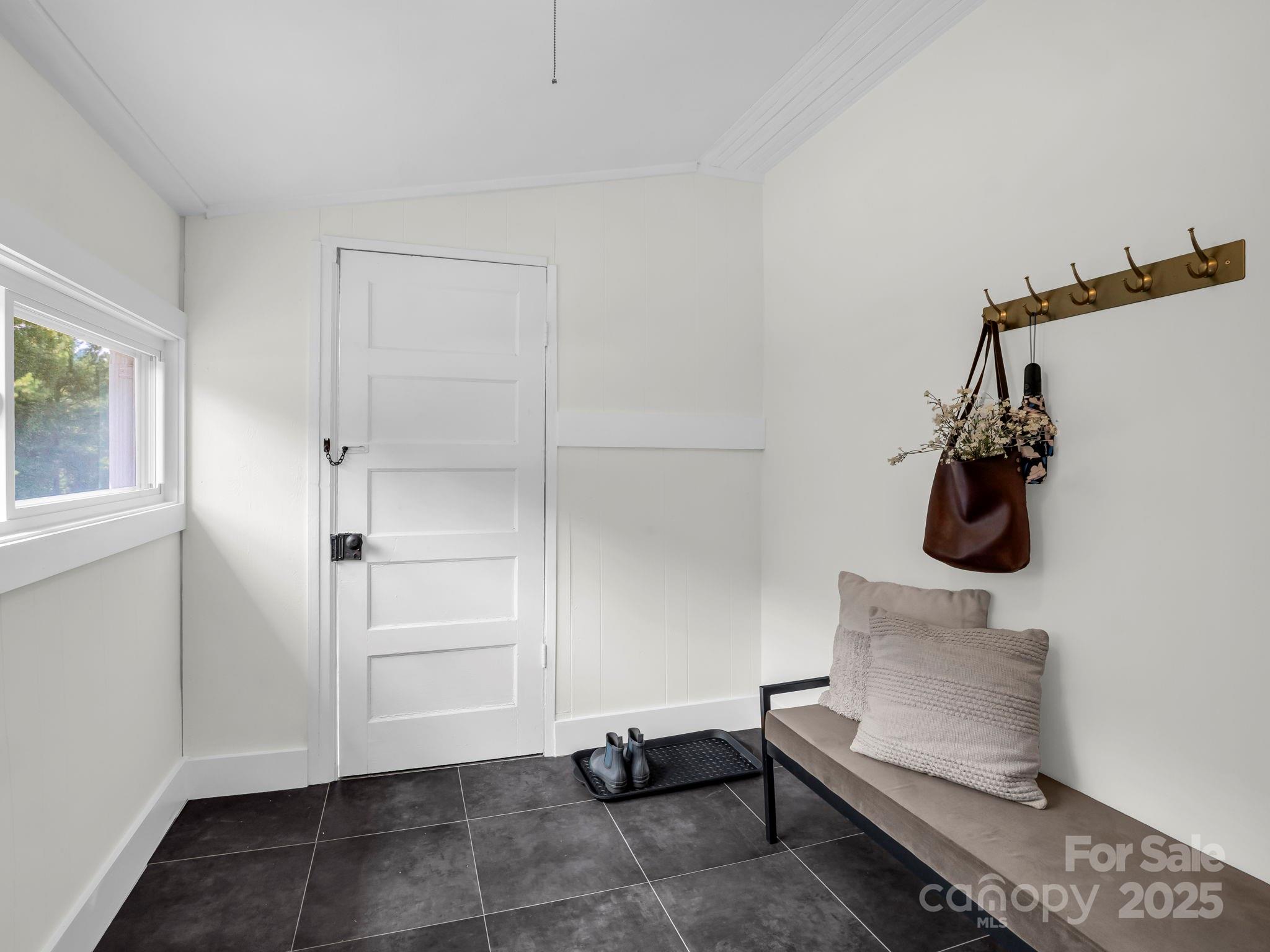 5990 South Nc 9 Highway Tryon, NC 28782 - Photo 35 of 42 a view of room with furniture and wooden floor