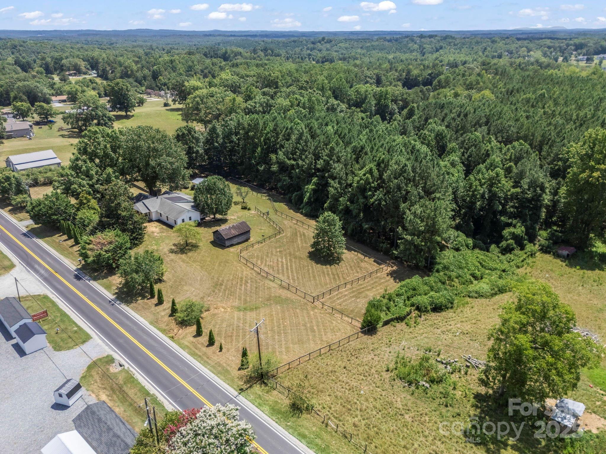 5990 South Nc 9 Highway Tryon, NC 28782 - Photo 41 of 42 a view of a garden with an outdoor seating