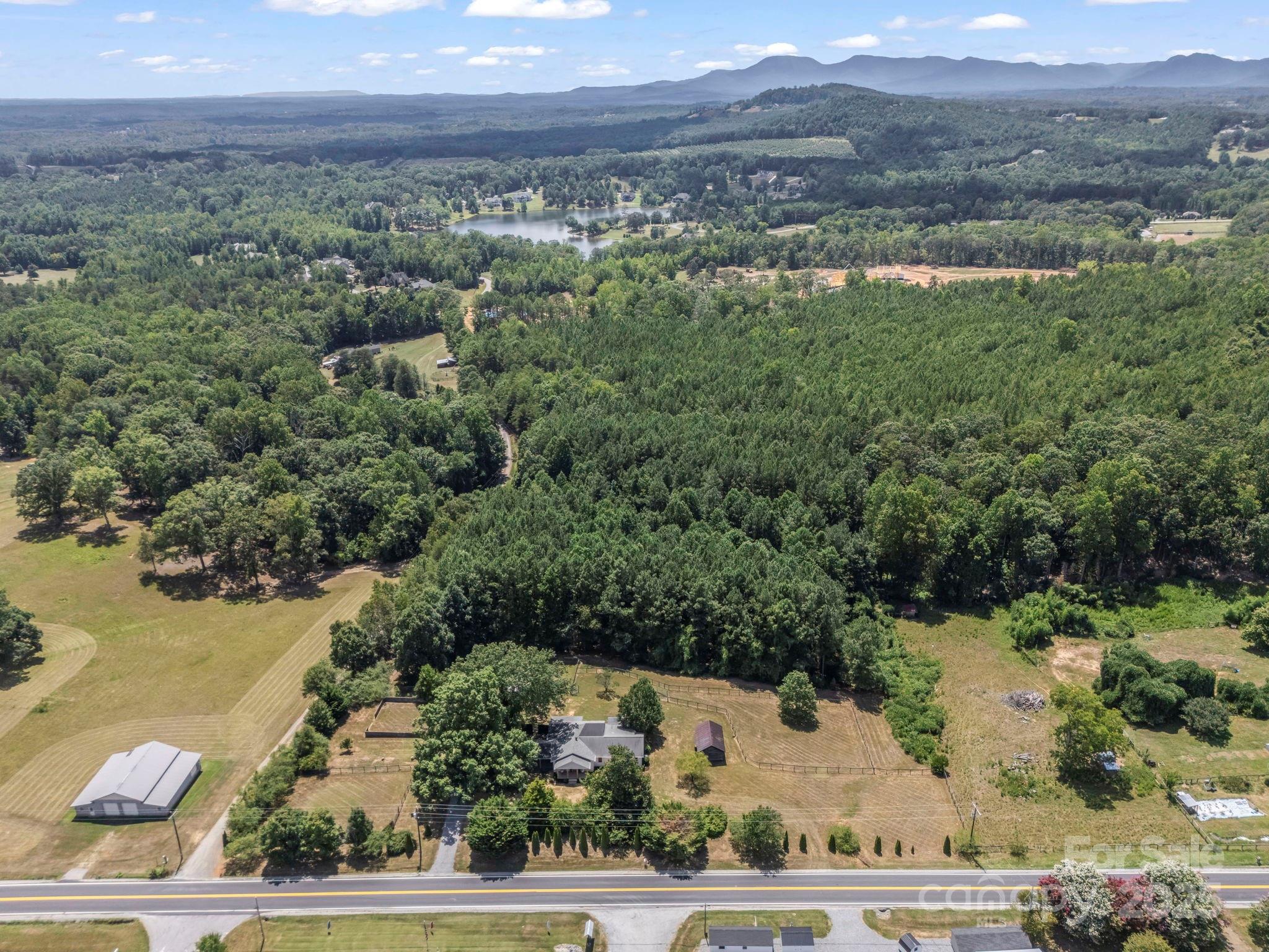 5990 South Nc 9 Highway Tryon, NC 28782 - Photo 10 of 42 an aerial view of mountain with trees all around
