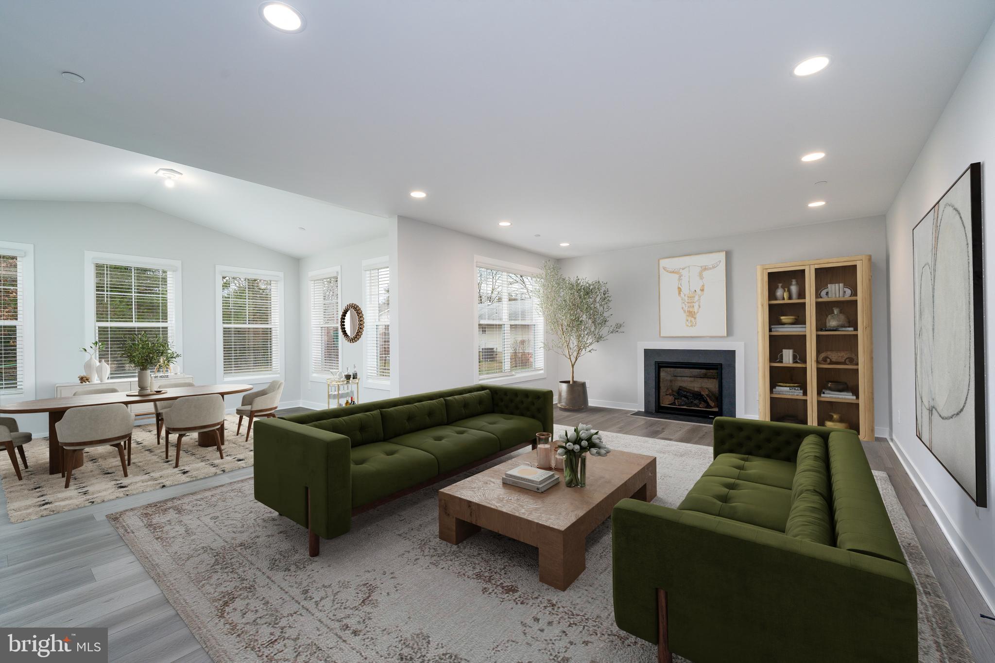 8118 Quarterfield Road Severn, MD 21144 - Photo 28 of 29 a living room with furniture and a fireplace