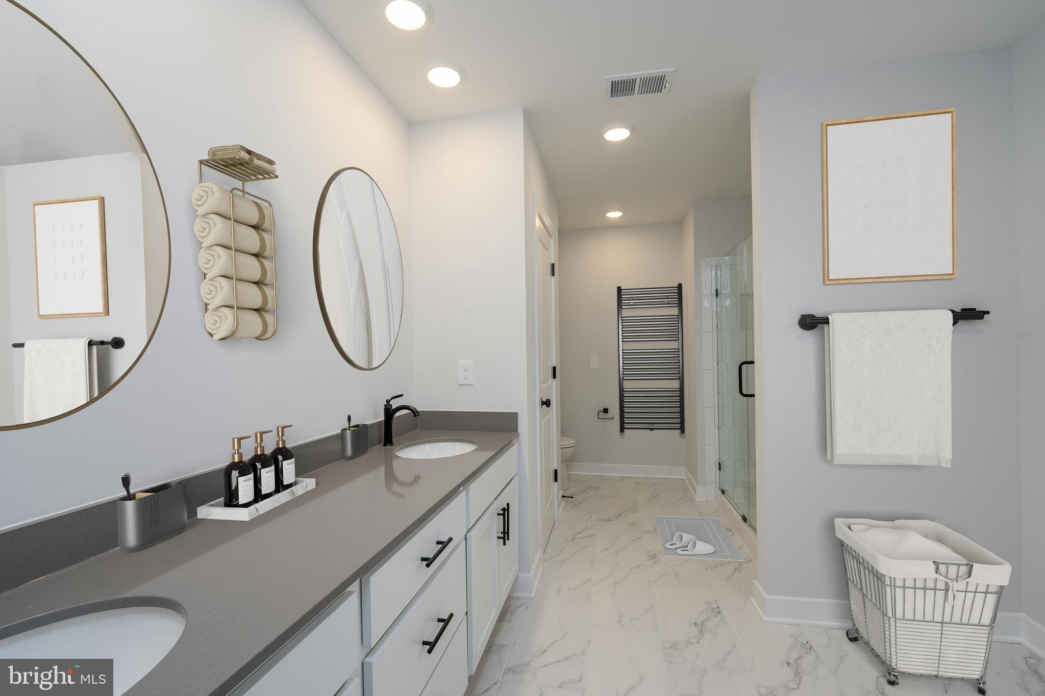 8118 Quarterfield Road Severn, MD 21144 - Photo 29 of 29 a spacious bathroom with a sink double vanity and a mirror
