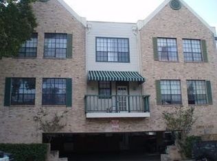 2300 Leon Street, Unit 302 Austin, TX 78705 - Photo 2 of 2 a front view of a house with a garden