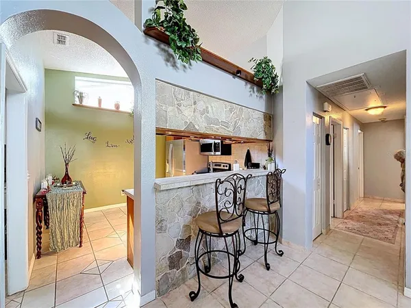 a kitchen with stainless steel appliances granite countertop a stove and a sink