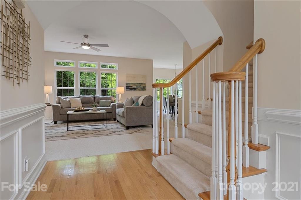 6616 Elfreda Road Charlotte, NC 28270 - Photo 3 of 37 a living room with furniture and a large window