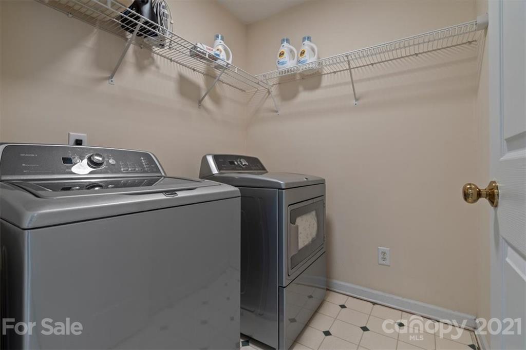 6616 Elfreda Road Charlotte, NC 28270 - Photo 28 of 37 a utility room with dryer and washer