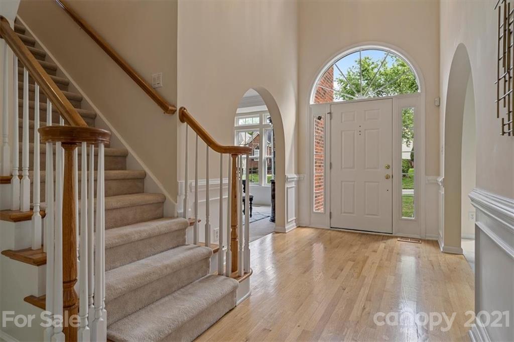 6616 Elfreda Road Charlotte, NC 28270 - Photo 4 of 37 a view of entryway with wooden floor