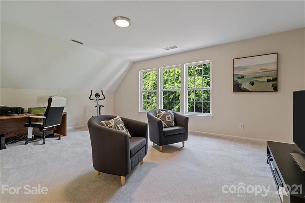 6616 Elfreda Road Charlotte, NC 28270 - Photo 33 of 37 a living room with furniture and a window