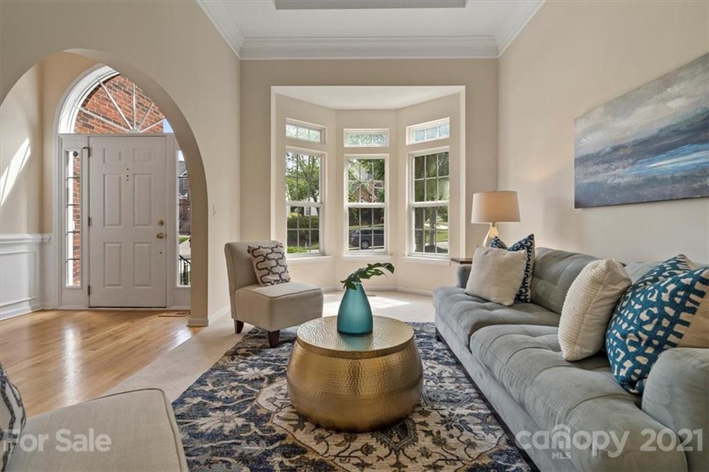 6616 Elfreda Road Charlotte, NC 28270 - Photo 6 of 37 a living room with furniture and a large window
