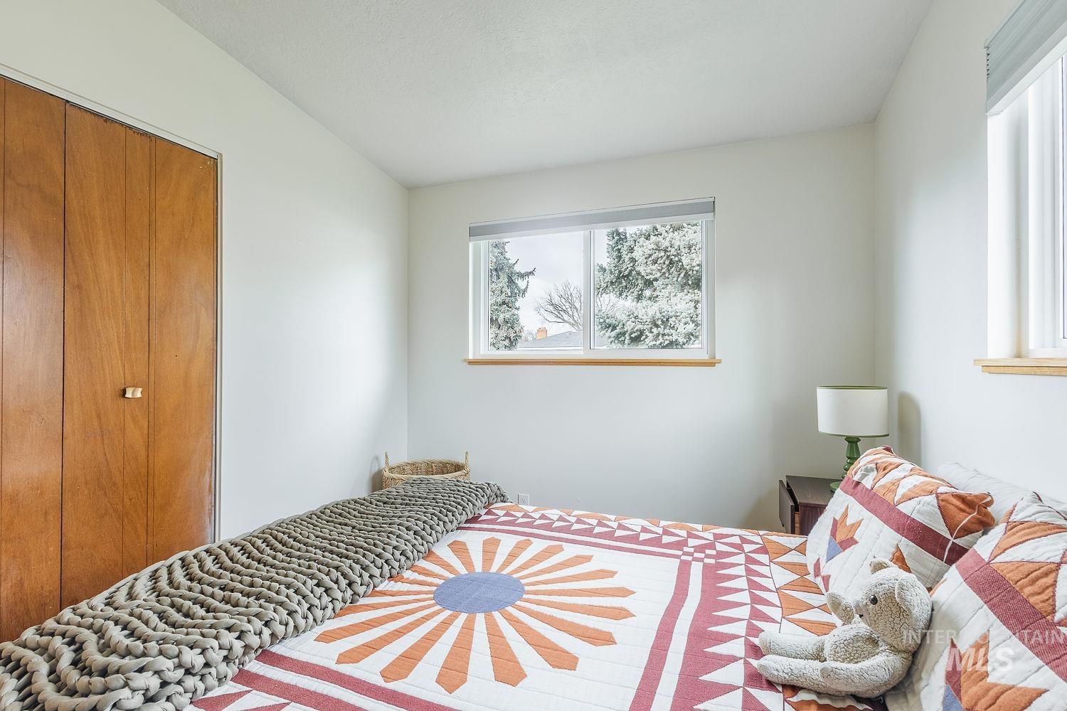 6403 Colonial Drive Boise, ID 83709 - Photo 27 of 42 Bedroom featuring a closet