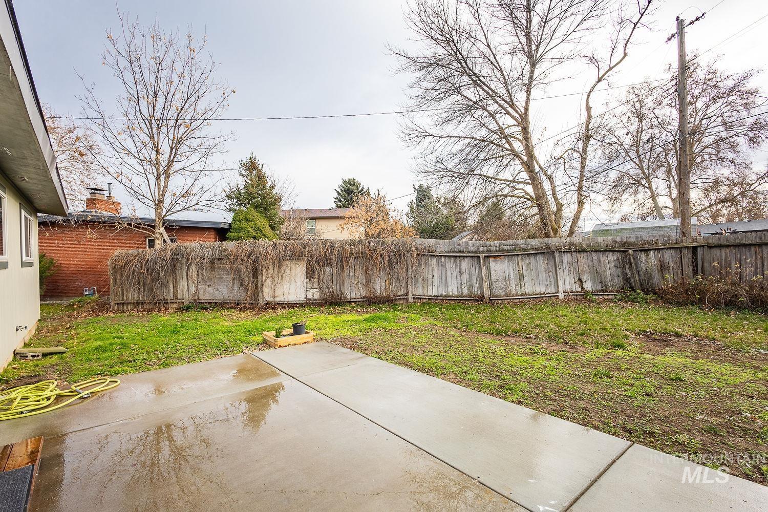 6403 Colonial Drive Boise, ID 83709 - Photo 32 of 42 Fenced backyard featuring a patio