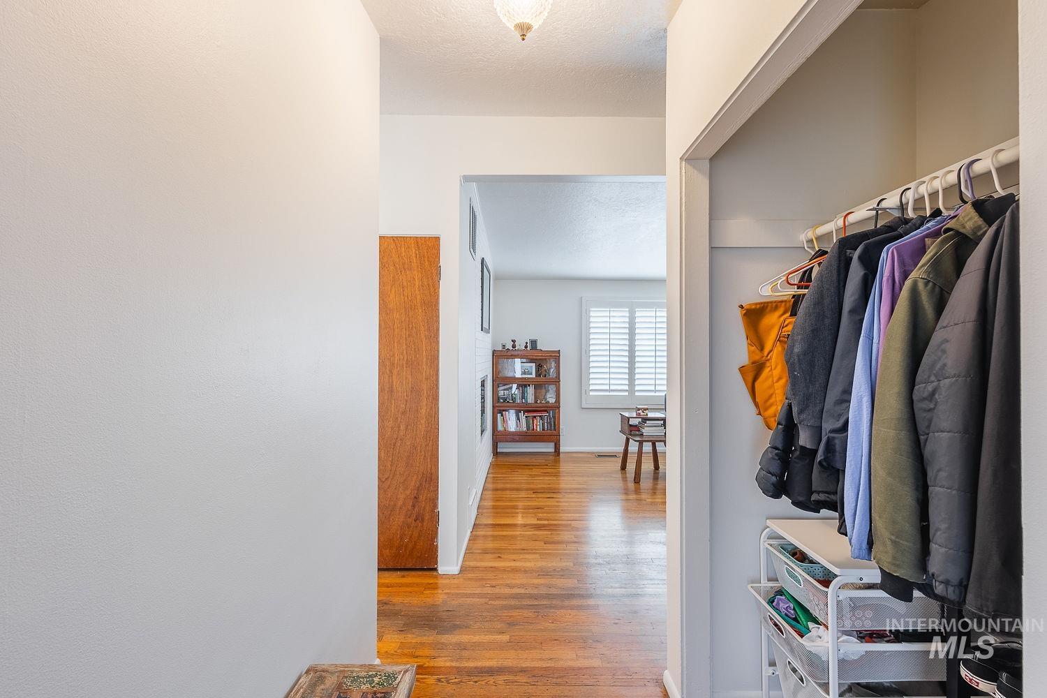 6403 Colonial Drive Boise, ID 83709 - Photo 5 of 42 Walk in closet featuring light wood-type flooring