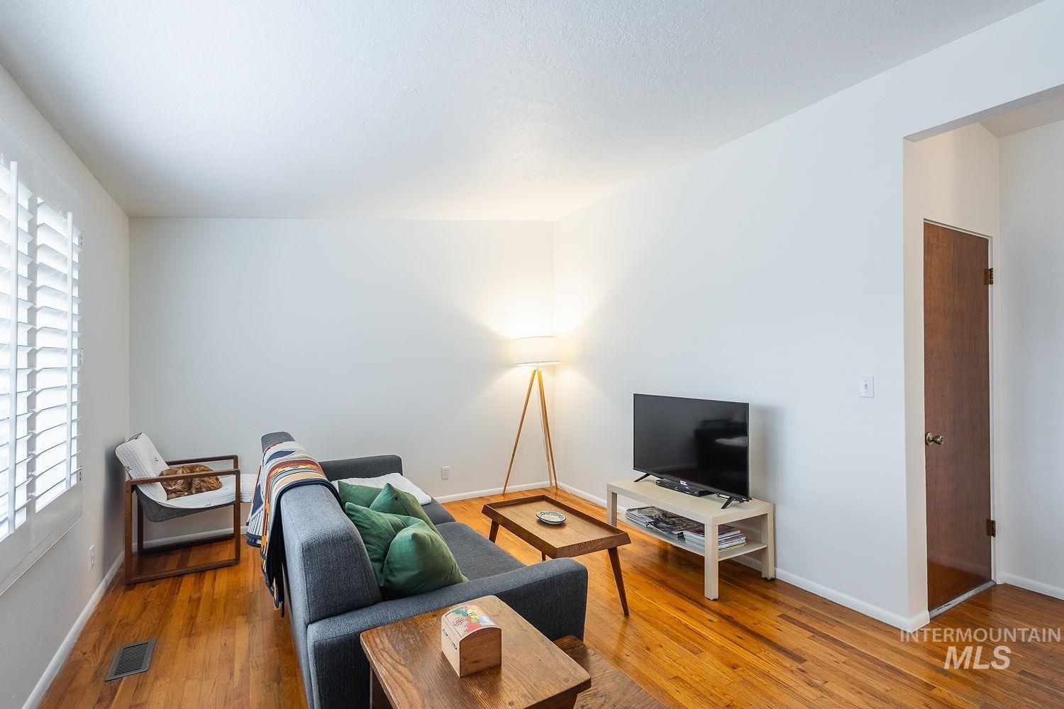 6403 Colonial Drive Boise, ID 83709 - Photo 7 of 42 Living area with hardwood / wood-style floors