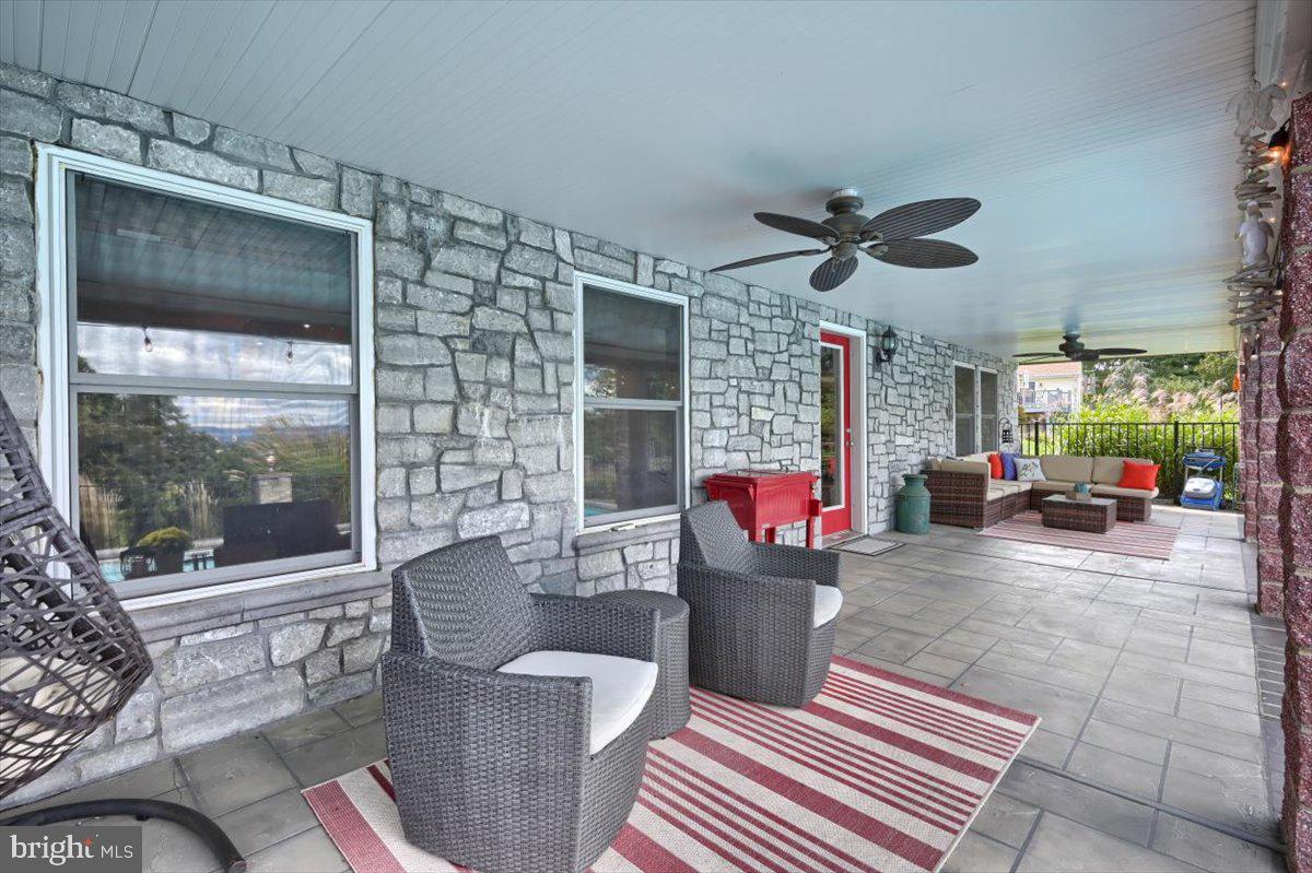 207 Hemlock Road New Cumberland, PA 17070 - Photo 38 of 51 Covered patio with fan for great airflow.