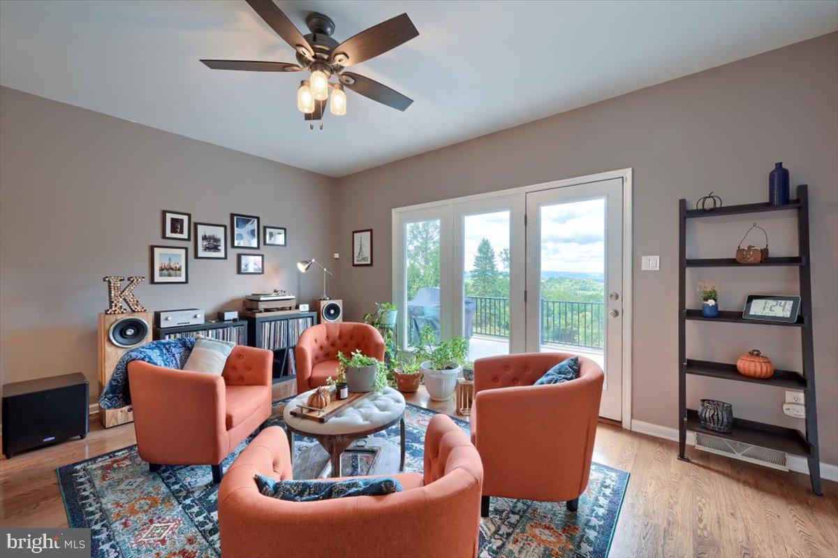207 Hemlock Road New Cumberland, PA 17070 - Photo 9 of 51 9' glass doors overlooking your sensational view!