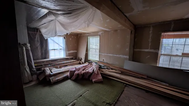 a view of a hallway with couch