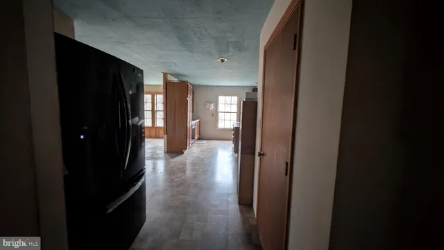 a view of a hallway with entryway