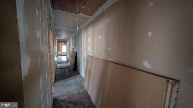 a view of a hallway with workspace