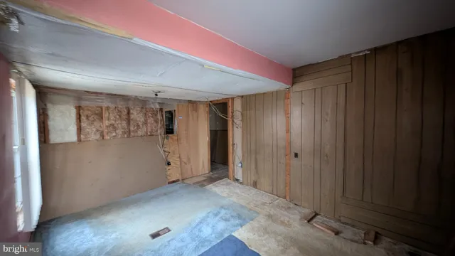 a view of livingroom with furniture and closet