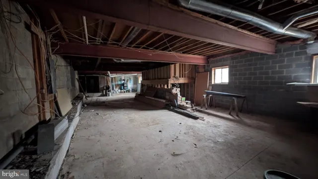 a view of backyard with outdoor seating and green space