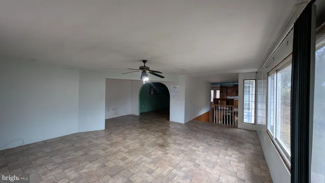 a view of a livingroom with a staircase