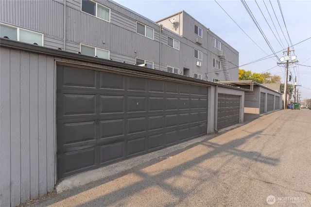 a view of street with parked cars