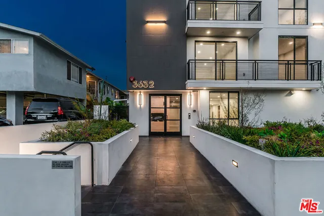 a view of a room that has a large window