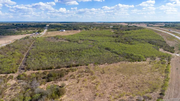 a view of a lake with a city