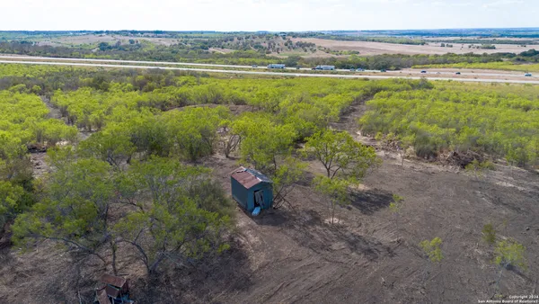 a view of a lake with a big yard