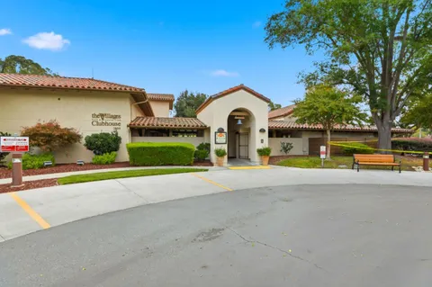 a view of swimming pool with an outdoor space and seating area