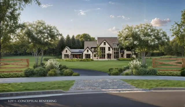 a view of a house with a yard and a fountain