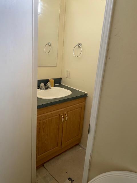 341 Reilly Road Merced, CA 95341 - Photo 13 of 14 a bathroom with a sink and a mirror