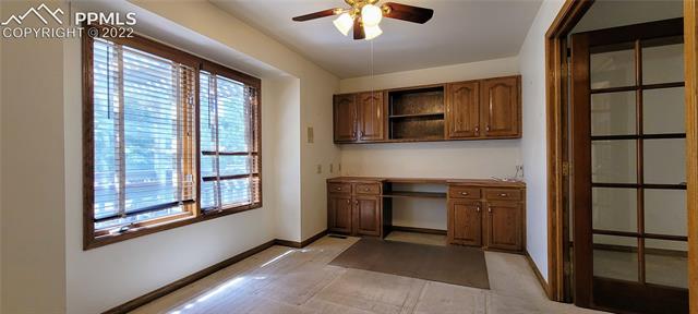 731 Winding Hills Road Monument, CO 80132 - Photo 4 of 9 Office with built-in desk and cabinets