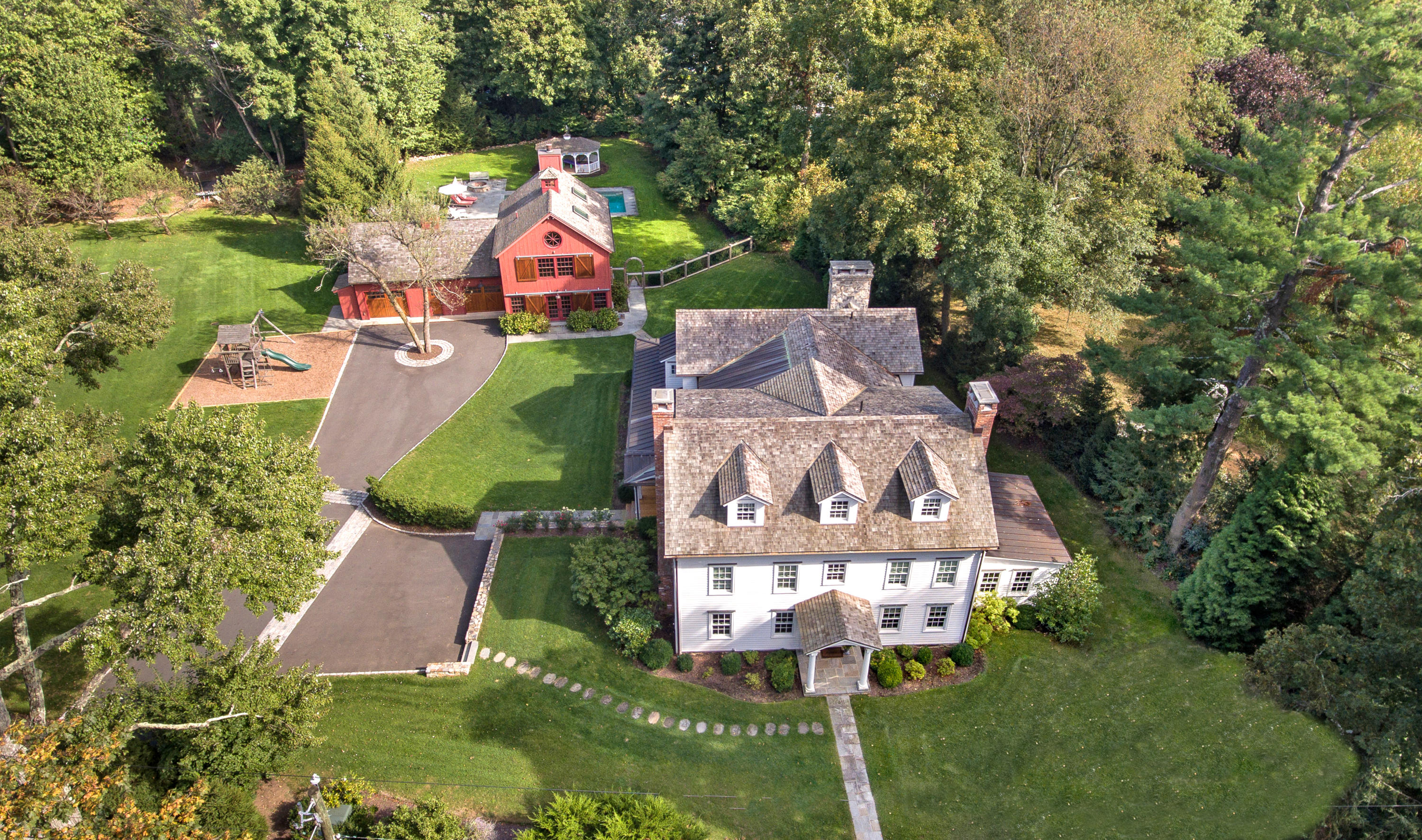 350 Hollow Tree Ridge Road Darien, CT 06820 - Photo 1 of 40 an aerial view of a house