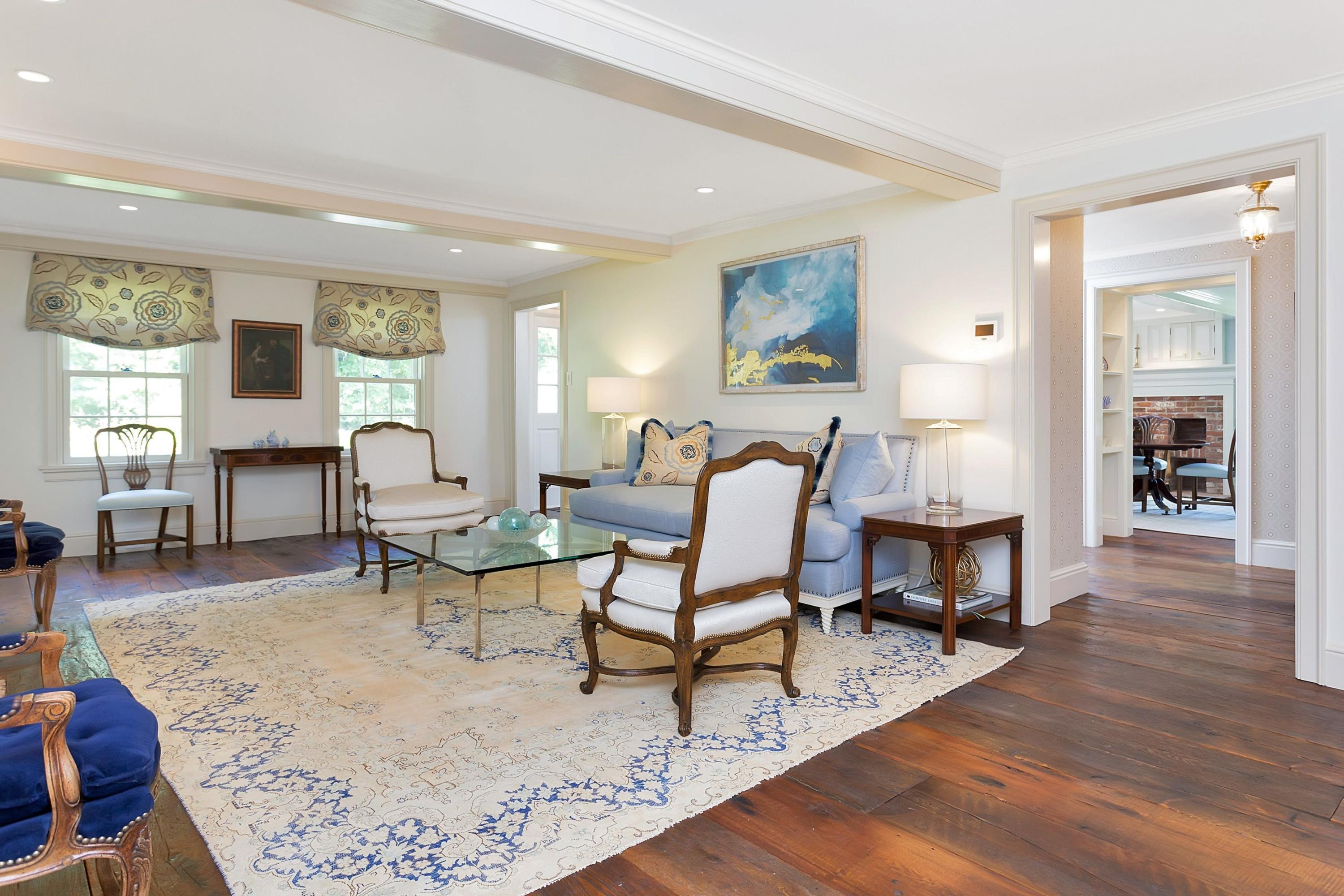 350 Hollow Tree Ridge Road Darien, CT 06820 - Photo 5 of 40 a living room with furniture and a wooden floor