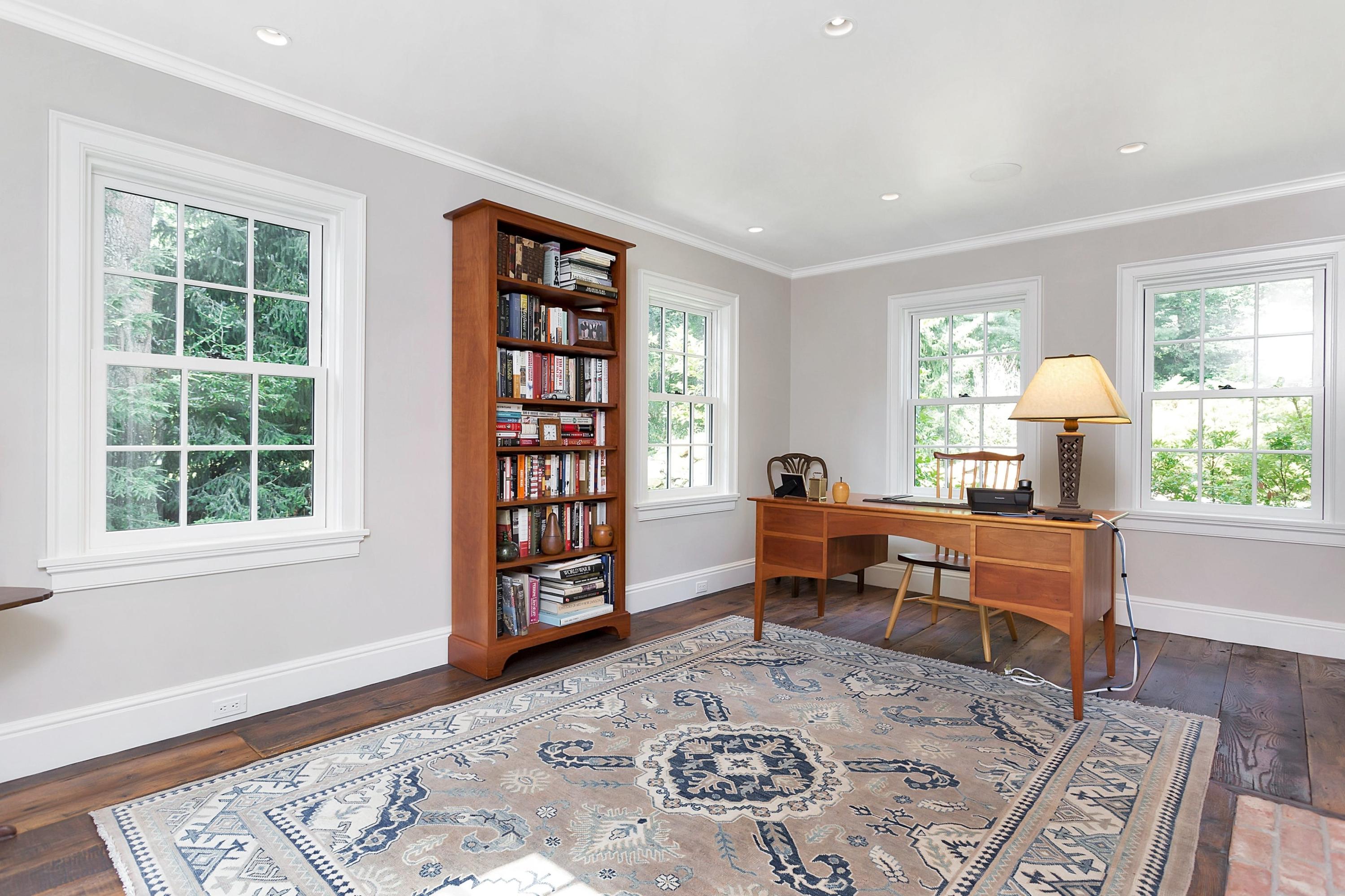350 Hollow Tree Ridge Road Darien, CT 06820 - Photo 6 of 40 a living room with furniture and a window