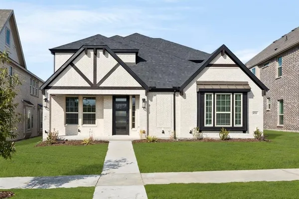 front view of a house with a yard