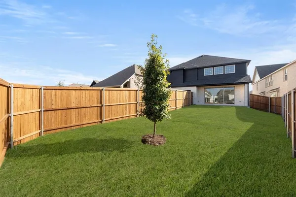 a house view with garden space