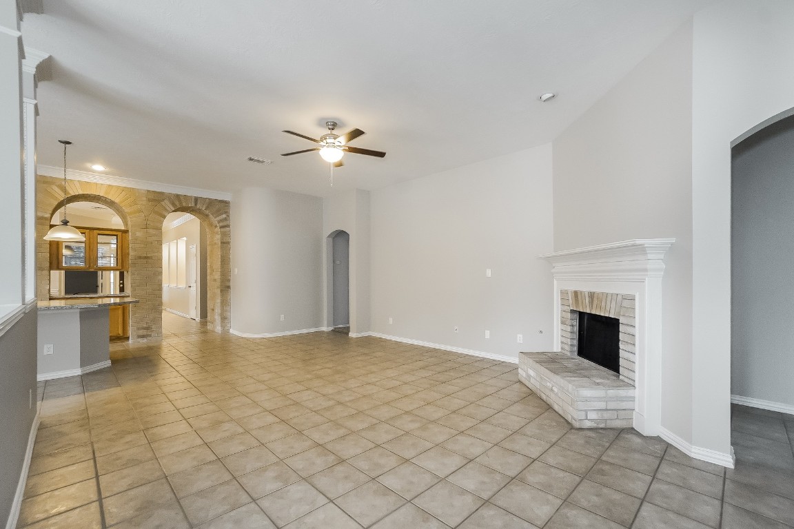 16042 Belleshire Lane Houston, TX 77084 - Photo 2 of 18 a view of a room with window and fireplace