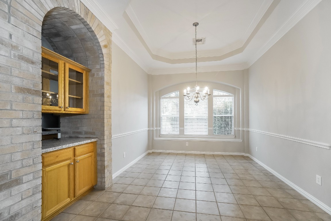 16042 Belleshire Lane Houston, TX 77084 - Photo 4 of 18 a view of an empty room with a window