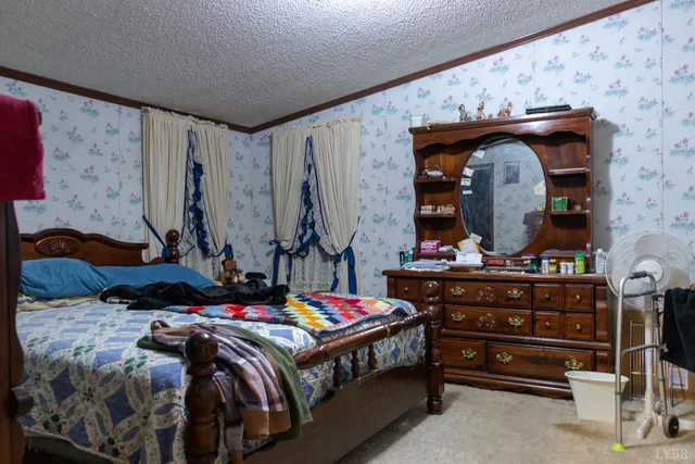 a bathroom with a double vanity sink toilet and shower