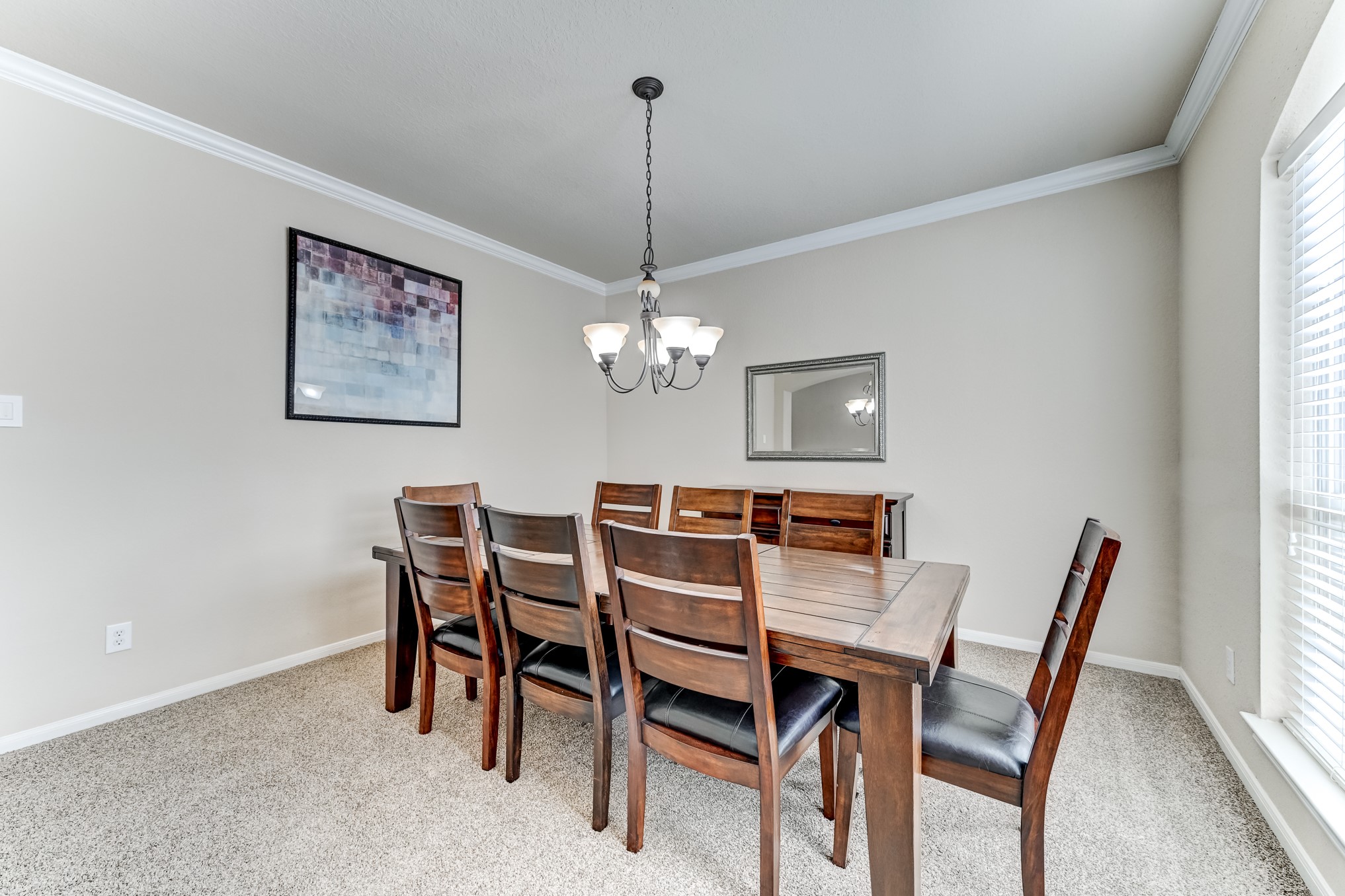 19502 Valkyrie Drive Spring, TX 77379 - Photo 18 of 49 a dining room with furniture and window