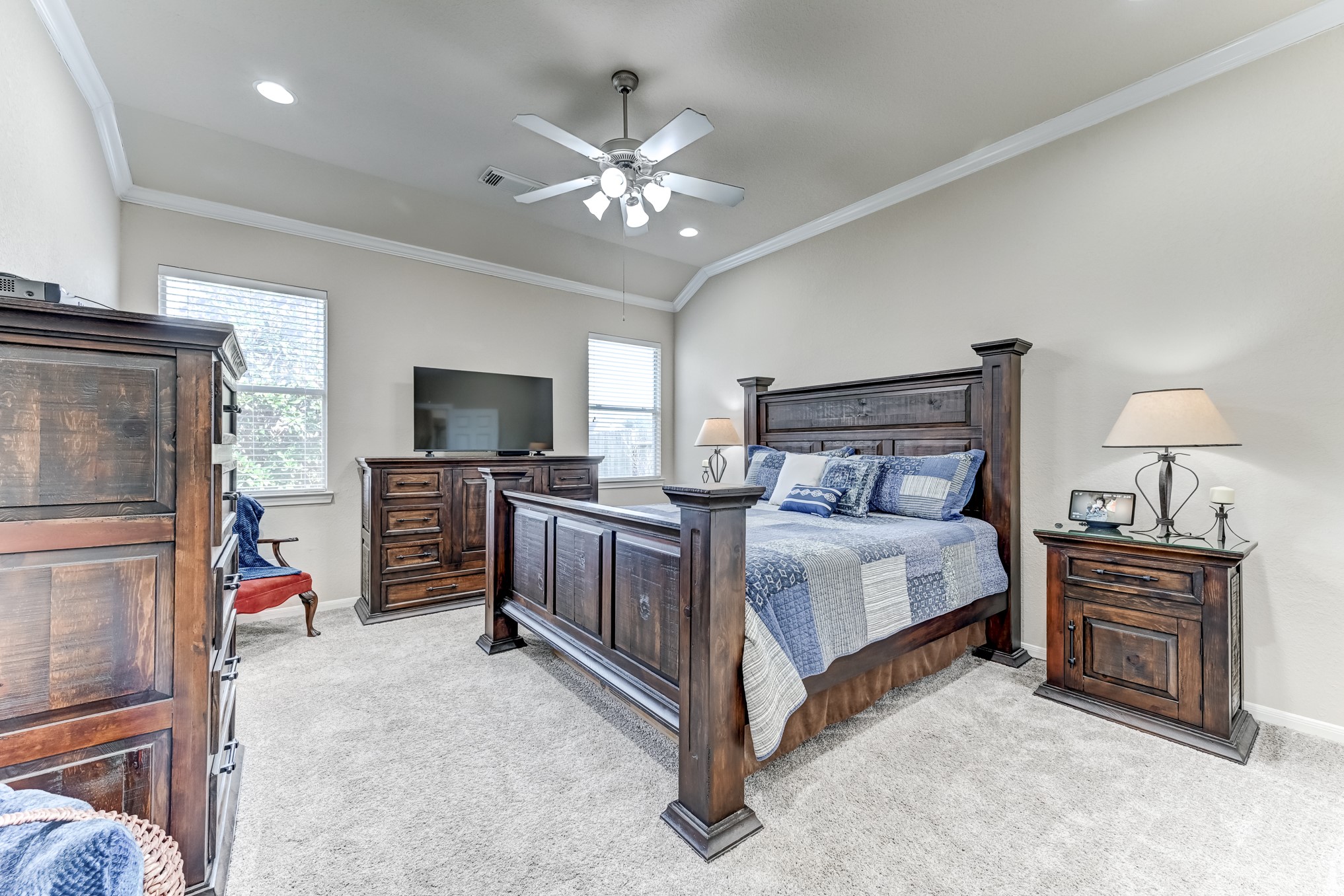 19502 Valkyrie Drive Spring, TX 77379 - Photo 21 of 49 a bedroom with a bed and a television