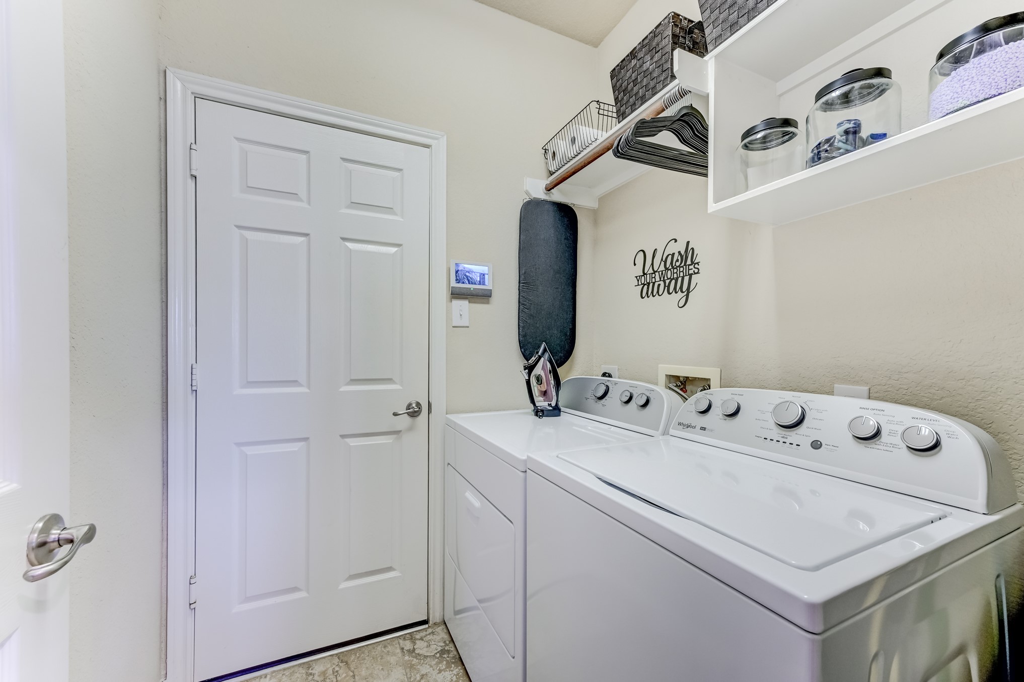 19502 Valkyrie Drive Spring, TX 77379 - Photo 45 of 49 a utility room with dryer and washer