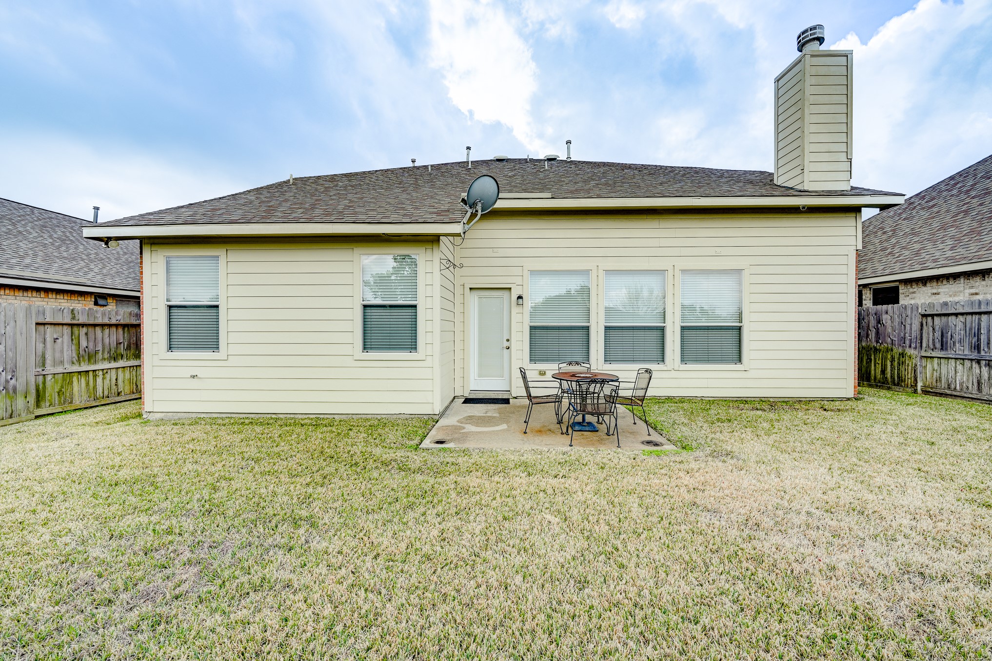 19502 Valkyrie Drive Spring, TX 77379 - Photo 49 of 49 a backyard of a house with table and chairs