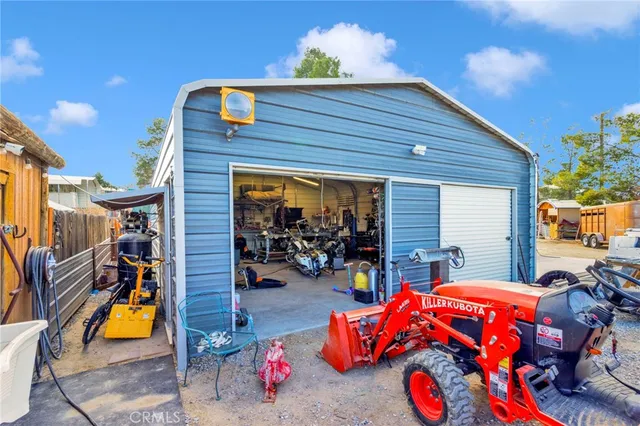 a front view of house with outdoor seating