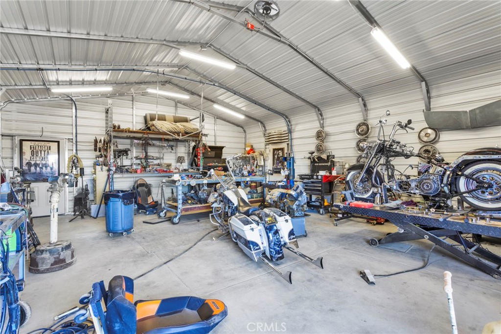 18608 Cocqui Road Apple Valley, CA 92307 - Photo 23 of 30 a view of a room with gym equipment