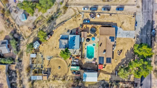 an aerial view of a house with a outdoor space
